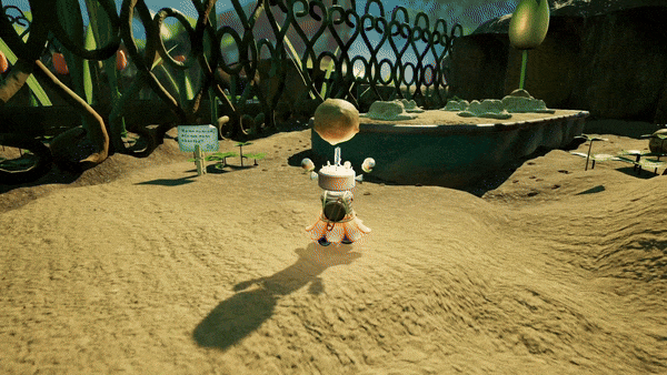 A scene of a robot planting a seed into a hole.